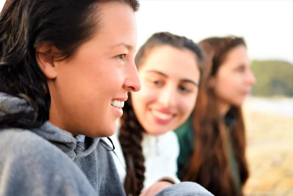 teen smiling with friends